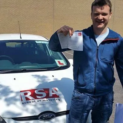 Learner celebrating passing the driving test in Dublin